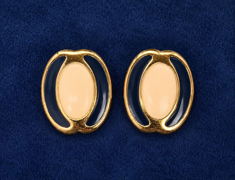 Vintage Monet cream and navy blue enamel gold tone oval statement earrings rare